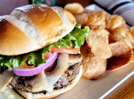 The 1830 Angus burger served with parmesan kettle chips