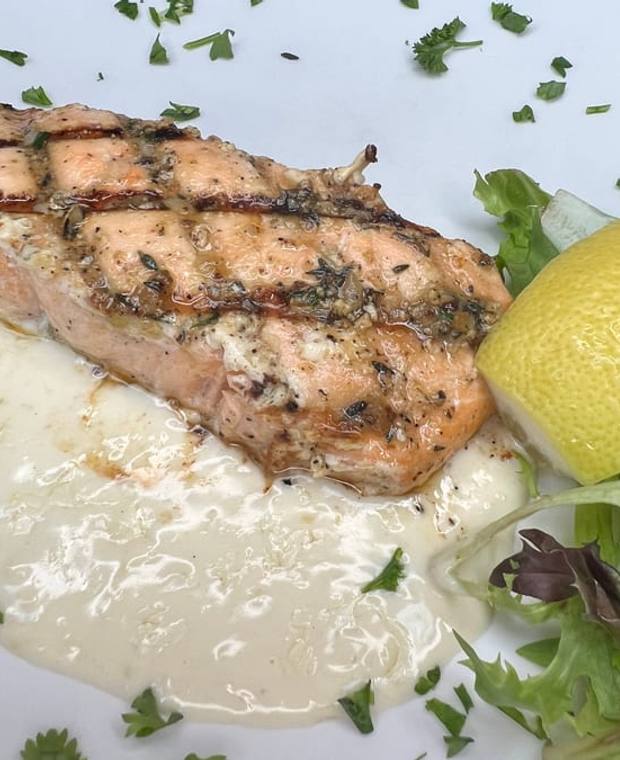 Grilled Faroe Island salmon finished with lemon beurre blanc